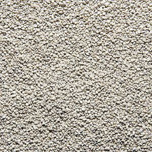 Nærbillede af hvid farvet sand 1,2-1,8 mm der anvendes til stentæppe, fugefri gulve, slidstærke gulve og skridsikre gulve på industrigulv, butiksgulv, showroomgulv, værkstedsgulv, kontorgulv, køkkengulv og vådrumsgulv og leveres af ekspert i og leverandør af materialer til gulve Stonewalk