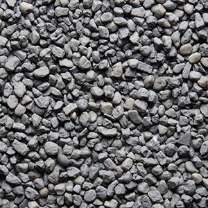 Nærbillede af grå farvet sand 3-6 mm der anvendes til stentæppe, fugefri gulve, slidstærke gulve og skridsikre gulve på industrigulv, butiksgulv, showroomgulv, værkstedsgulv, kontorgulv, køkkengulv og vådrumsgulv og leveres af ekspert i og leverandør af materialer til gulve Stonewalk