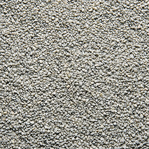 Nærbillede af lysgrå farvet sand 1,2-1,8 mm der anvendes til stentæppe, fugefri gulve, slidstærke gulve og skridsikre gulve på industrigulv, butiksgulv, showroomgulv, værkstedsgulv, kontorgulv, køkkengulv og vådrumsgulv og leveres af ekspert i og leverandør af materialer til gulve Stonewalk